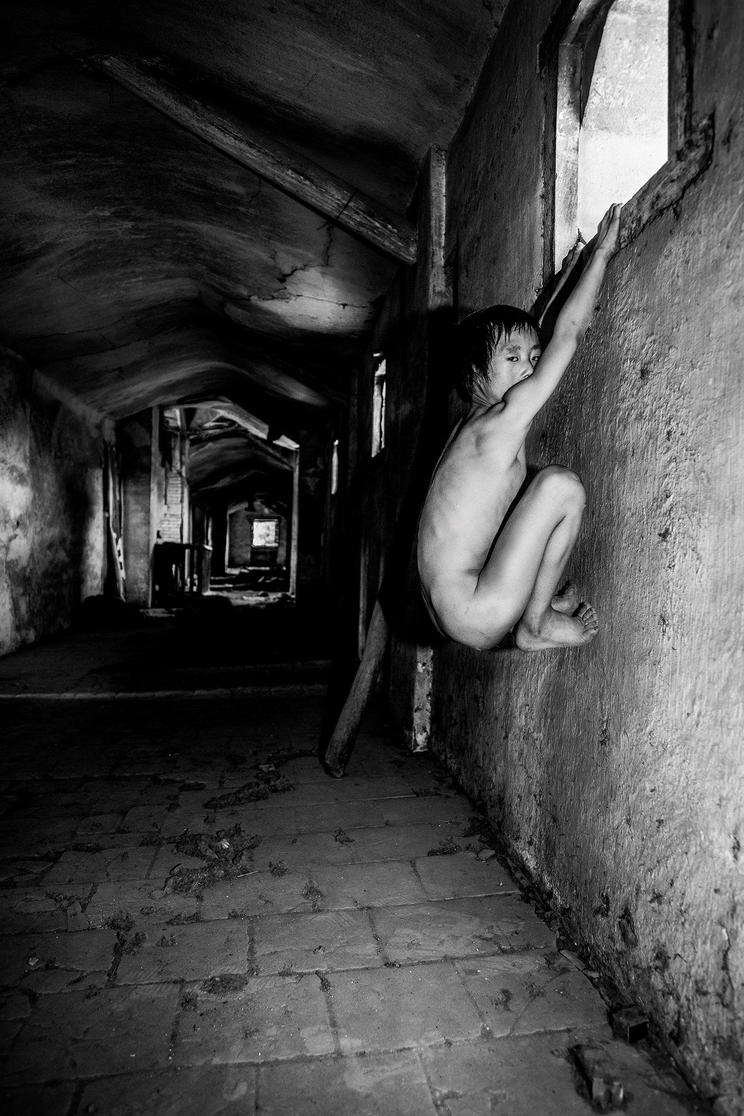 7 - A boy who is climbing a window and sneaking to swim, 12 years old. Hearing impairment..jpg